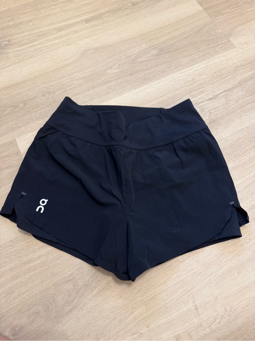 On Running Women's Black Athletic Shorts with Reflective Logo